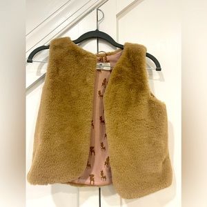 Like new, cute furry beige vest, size 8/10, from H&M. Worn one for an audition.